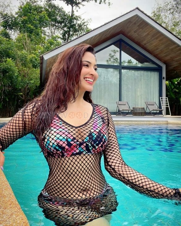 Hot Eshanya Maheshwari In A Transparent Fishnet Lingerie Photos