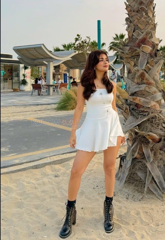 Hot Avneet Kaur in a Sleeveless Strapless White Mini Dress Photos 02