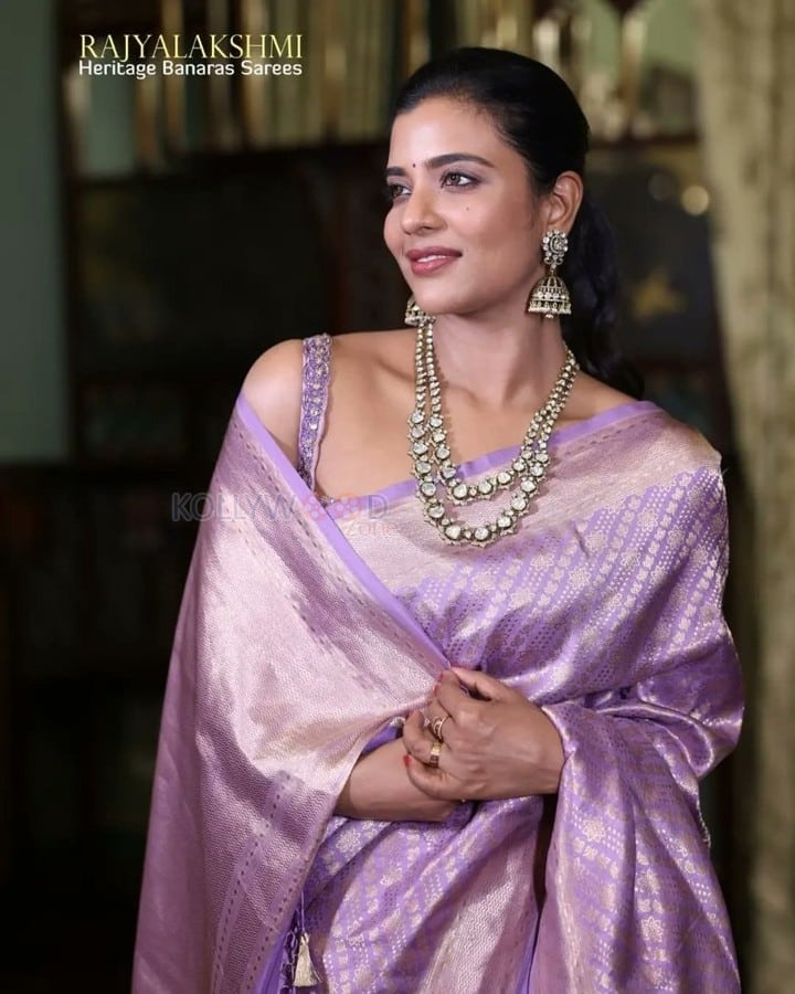 Actress Aishwarya Rajesh in a Purple Silk Saree with a Sleeveless Blouse Pictures 01