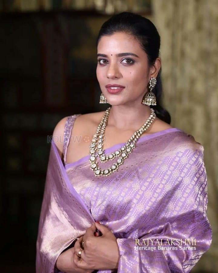 Actress Aishwarya Rajesh in a Purple Silk Saree with a Sleeveless Blouse Pictures 02