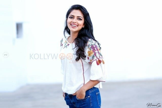 Actress Amala Paul In White Top And Blue Denim Photos