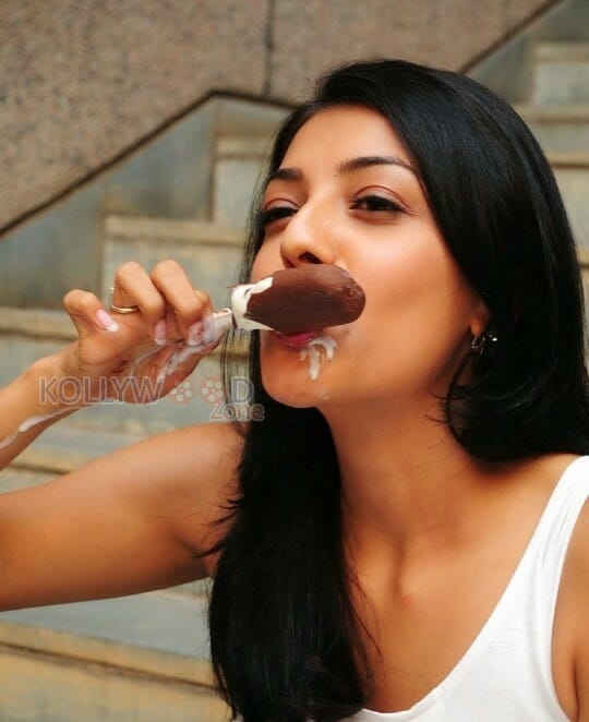 Actress Kajal Agarwal Licking And Sucking Ice Cream Photos