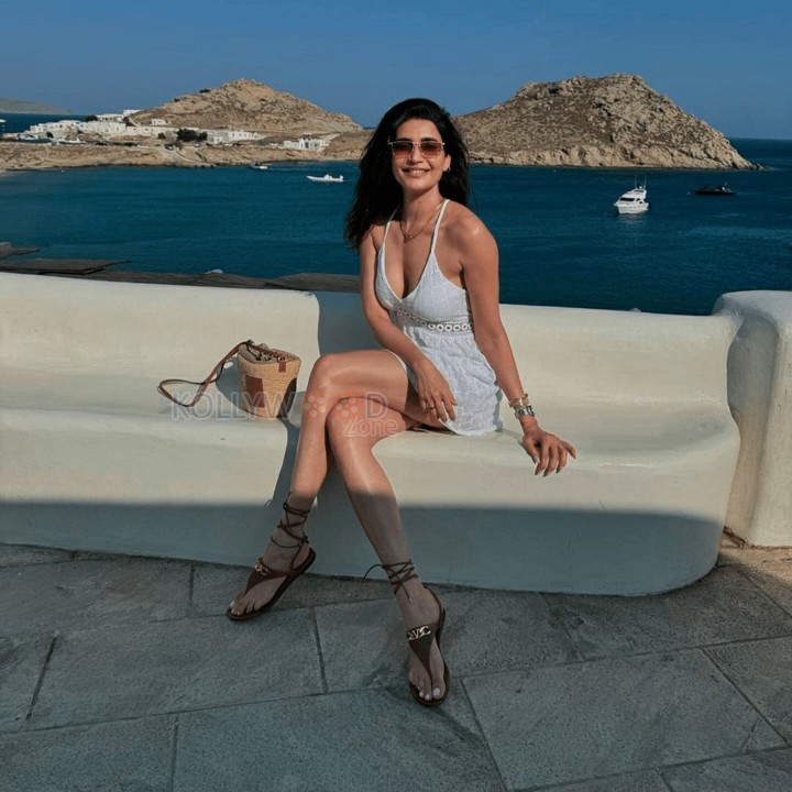 Actress Karishma Tanna Holidaying in a White Mini Dress Pictures 01