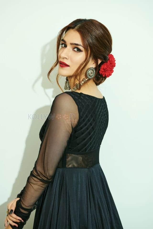 Actress Kriti Sanon in a Black Gown with Transparent Sleeves Photo 01