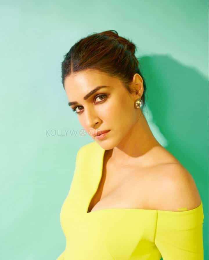 Actress Kriti Sanon in a Neon Yellow Co Ord Set Photos 01