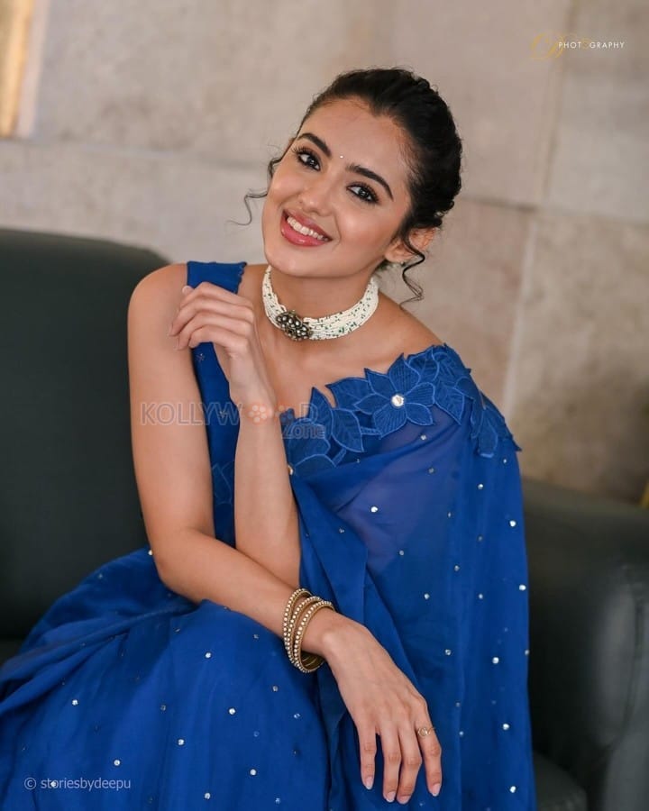 Actress Malvika Sharma in a Blue Sequin Saree at Bhimaa Thanks Meet Photos 05