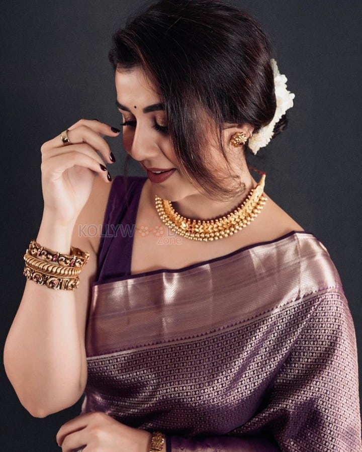 Actress Nikki Galrani in a Purple Silk Saree Photoshoot Pictures 04