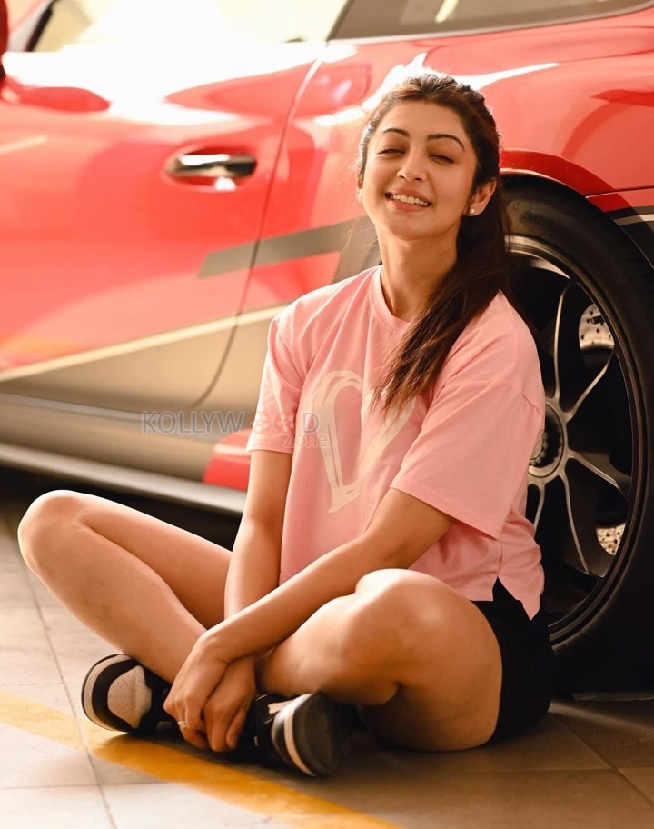 Actress Pranitha Subhash in a Pink Tshirt and Black Shorts Pictures 02