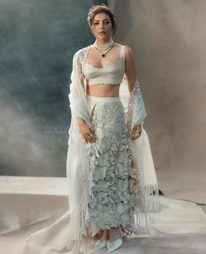 Beautiful Kajal Aggarwal in a White Embroidered Lehenga Photos 07