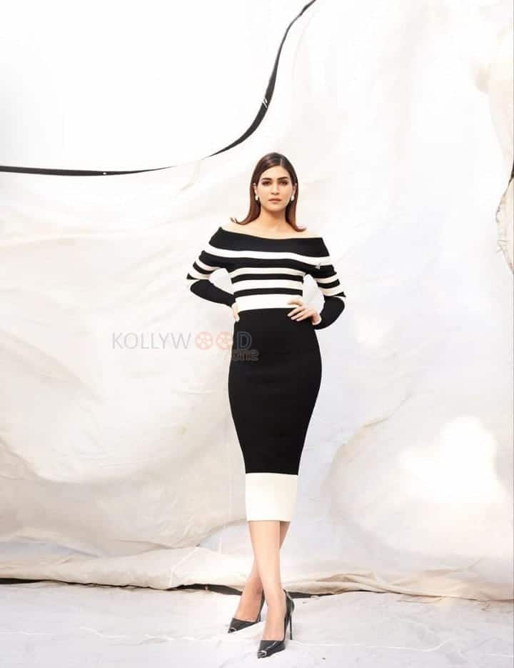 Beautiful Kriti Sanon in a Black and White Ribbed Knit Bodycon Dress Photos 02