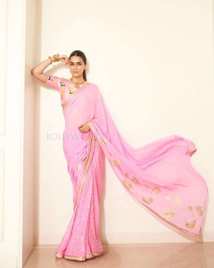 Beautiful Kriti Sanon in a Pink Saree with Floral Blouse Photos 03