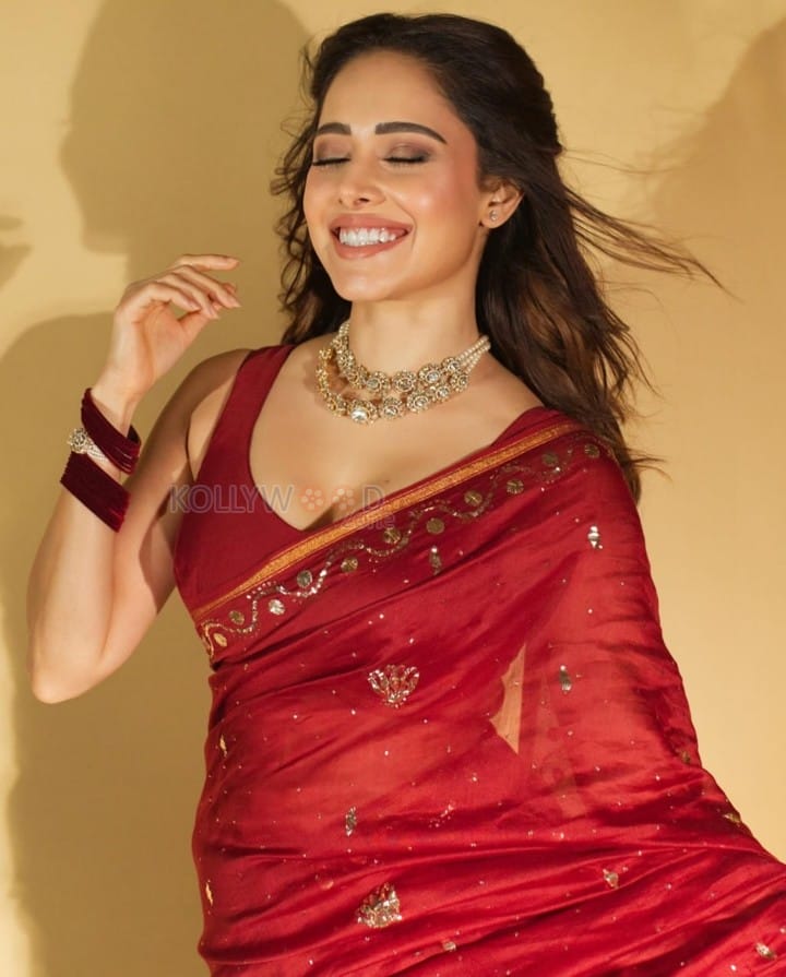 Beautiful Nushrratt Bharuccha in a Red Saree Photos 03