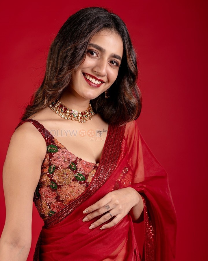 Beautiful Priya Prakash Varrier in a Glam Red Saree with a Sleeveless Blouse Pictures 03