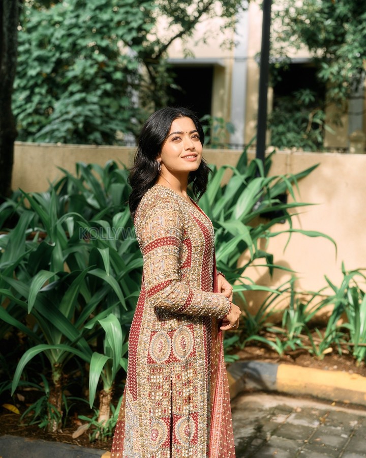 Beautiful Rashmika Mandanna in a Red and Golden Embroidered Kurta Set Photos 03