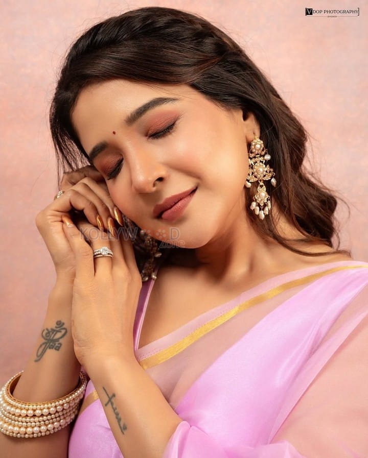 Beautiful Sakshi Agarwal in a Pink Transparent Saree with Pink Blouse Photos 05