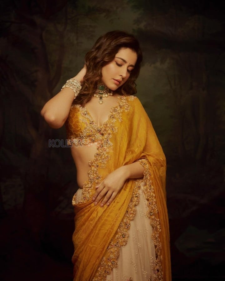 Beauty Queen Raashii Khanna in a Golden Blouse and Silver Skirt Half Saree Photos 02