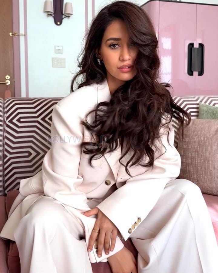 Bold Disha Patani in a White Oversized Pant Suit with Black Bra Photos 06