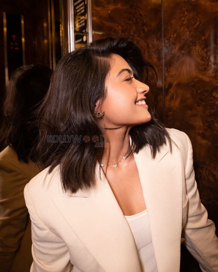 Charismatic Rashmika Mandanna in a Chic Cream Blazer Skirt and Top Photos 03