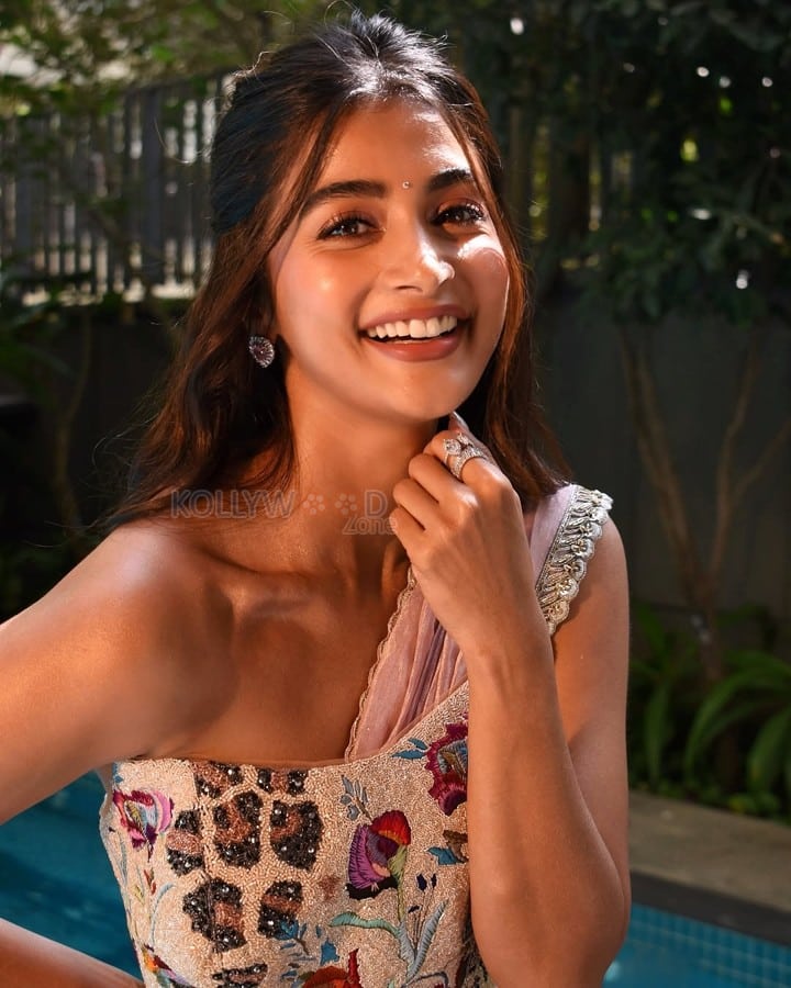 Charming Pooja Hegde in a Shoulder Baring Floral Printed Dress Photoshoot Photos 08