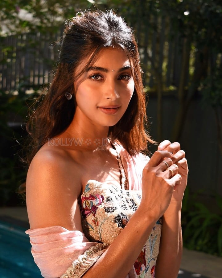 Charming Pooja Hegde in a Shoulder Baring Floral Printed Dress Photoshoot Photos 09