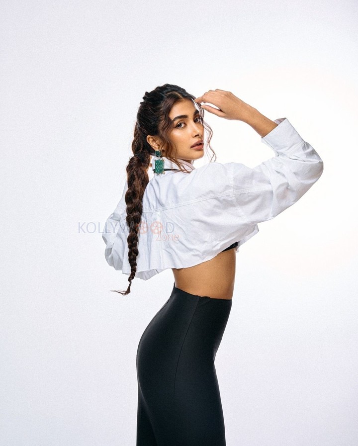 Classy Pooja Hegde in a White Full Sleeve Crop Shirt and Black Pant Photos 05