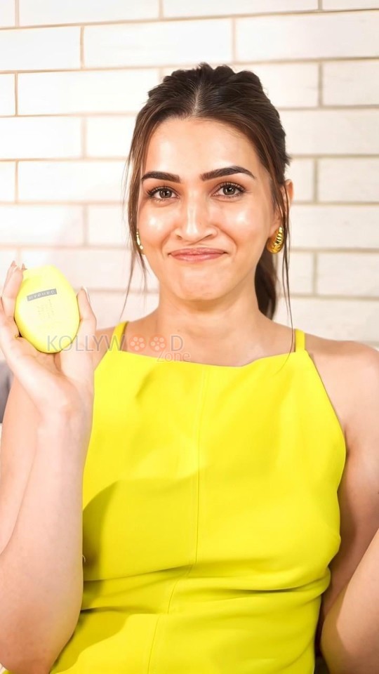 Cute Kriti Sanon in a Bright Yellow Top Pictures 03