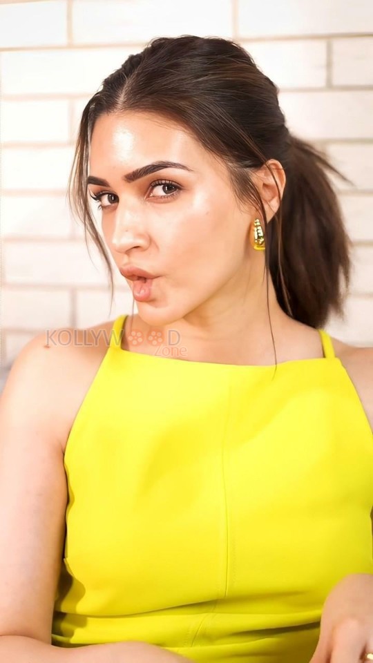 Cute Kriti Sanon in a Bright Yellow Top Pictures 04