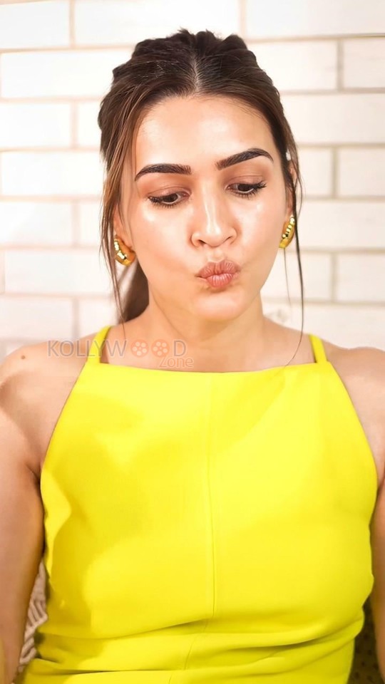 Cute Kriti Sanon in a Bright Yellow Top Pictures 05