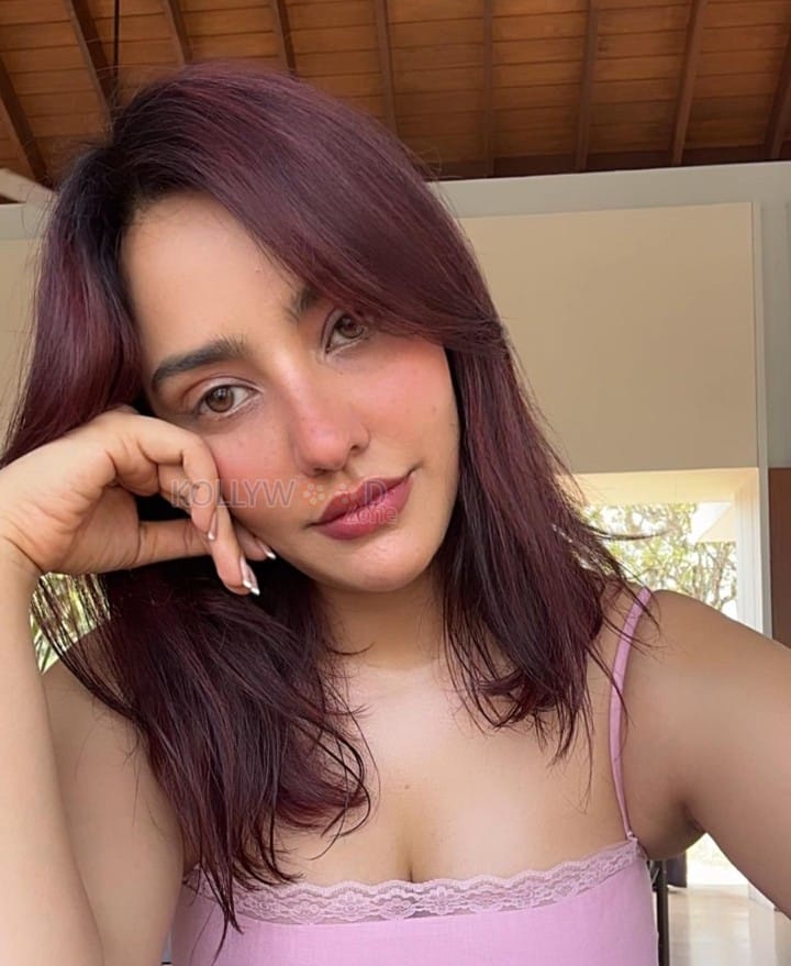 Cute Neha Sharma in a Pink Camisole Photos 02