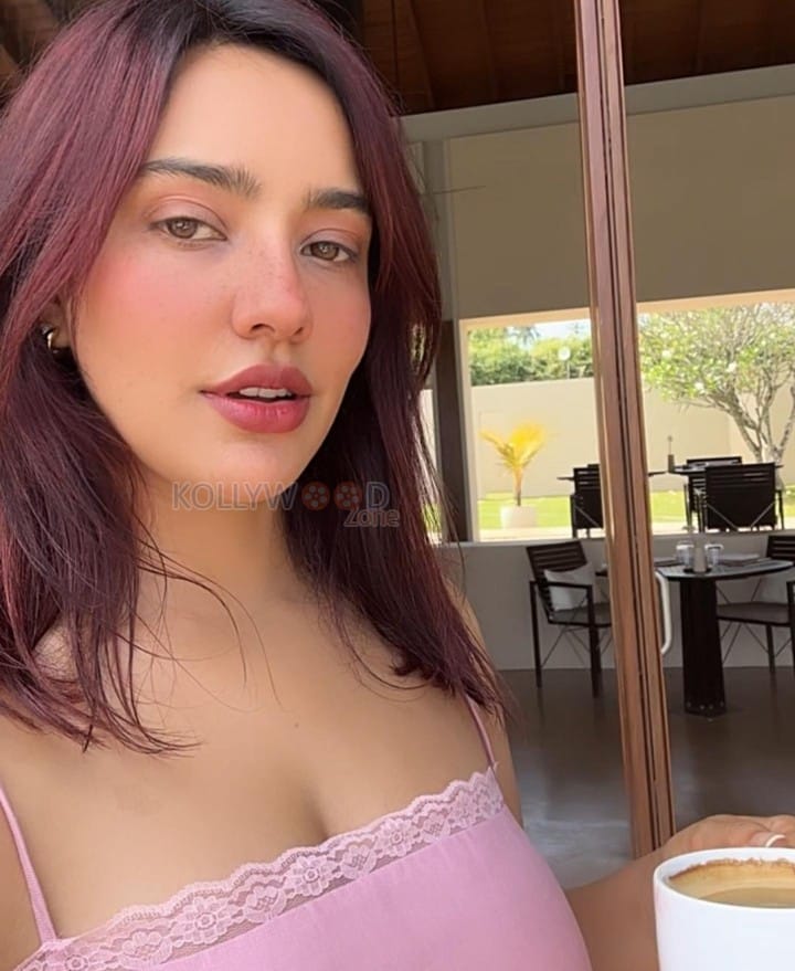 Cute Neha Sharma in a Pink Camisole Photos 03