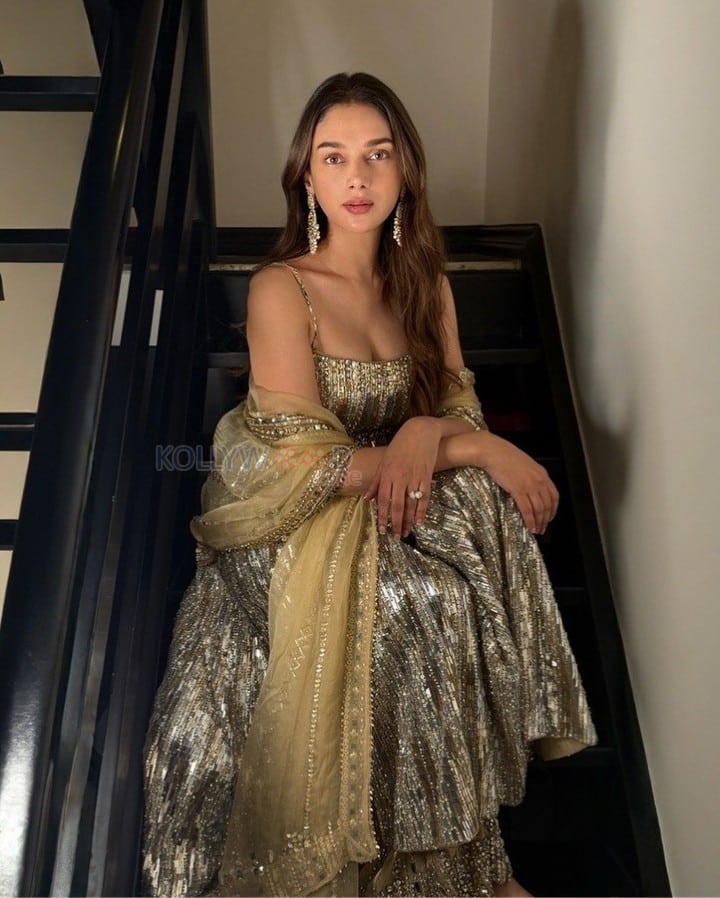 Dazzling Aditi Rao Hydari in a Gold and Silder Sharara Set Photos 02