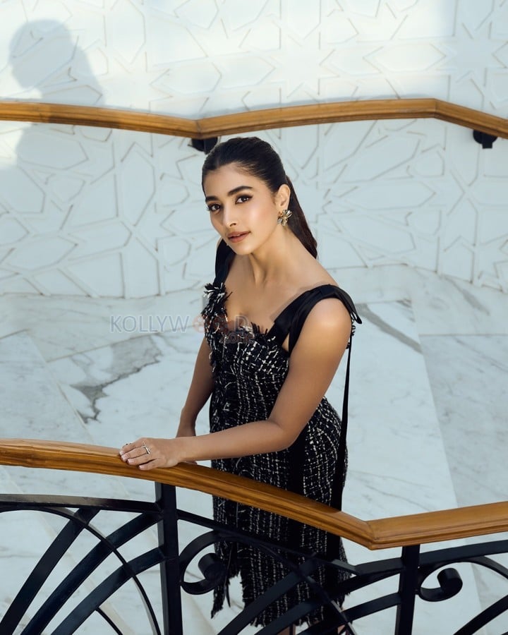 Dazzling Pooja Hegde in a Black Sleeveless Tweed Dress Pictures 01