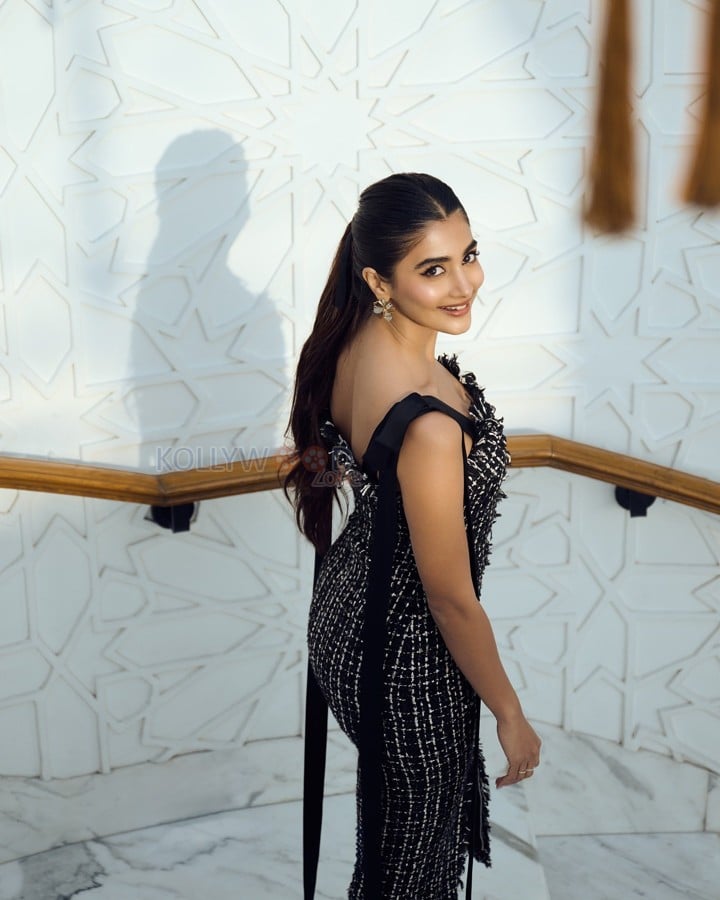 Dazzling Pooja Hegde in a Black Sleeveless Tweed Dress Pictures 03