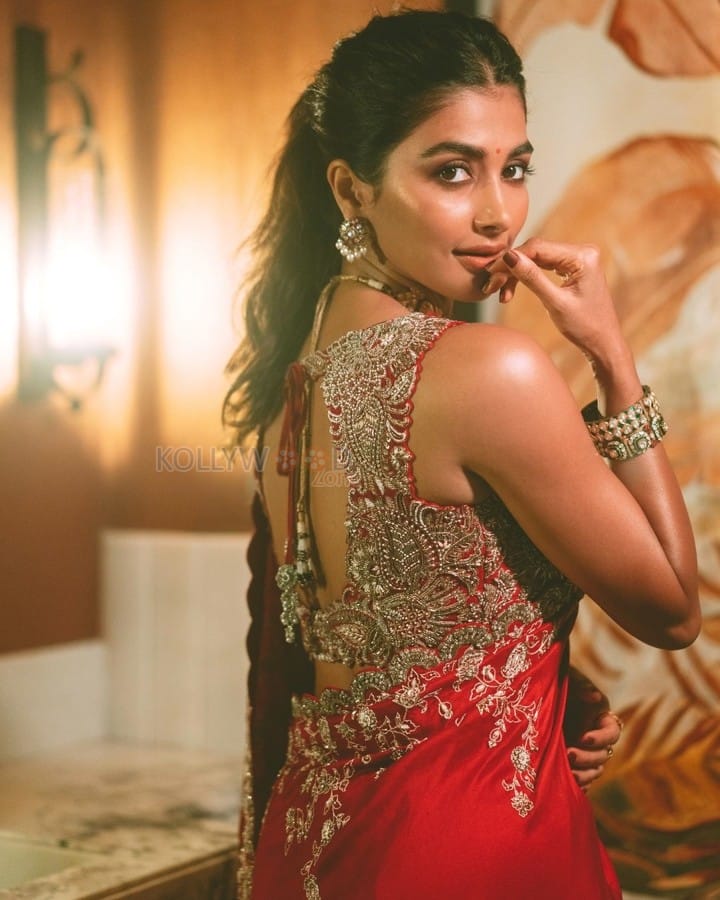 Dazzling Pooja Hegde in a Red Silk Saree at Anant Ambani and Radhika Merchant Sangeet Celebration Photos 02