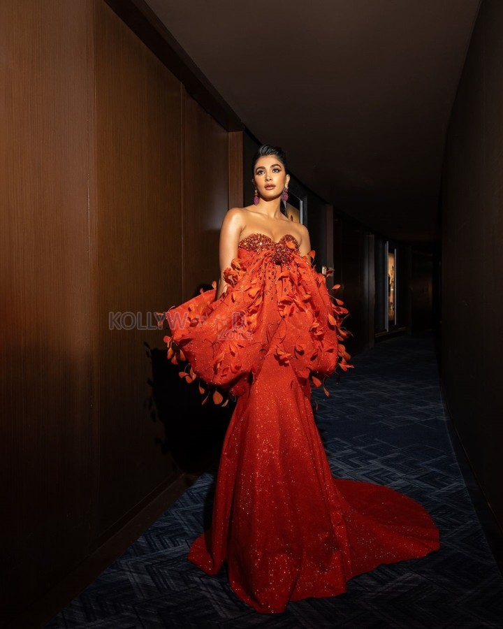 Deva Heroine Pooja Hegde in an Orange Sequined Gown Photos 05