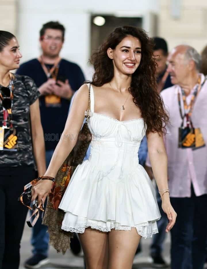 Disha Patani at Doha F1 Race in a White Mini Skirt Photos 01