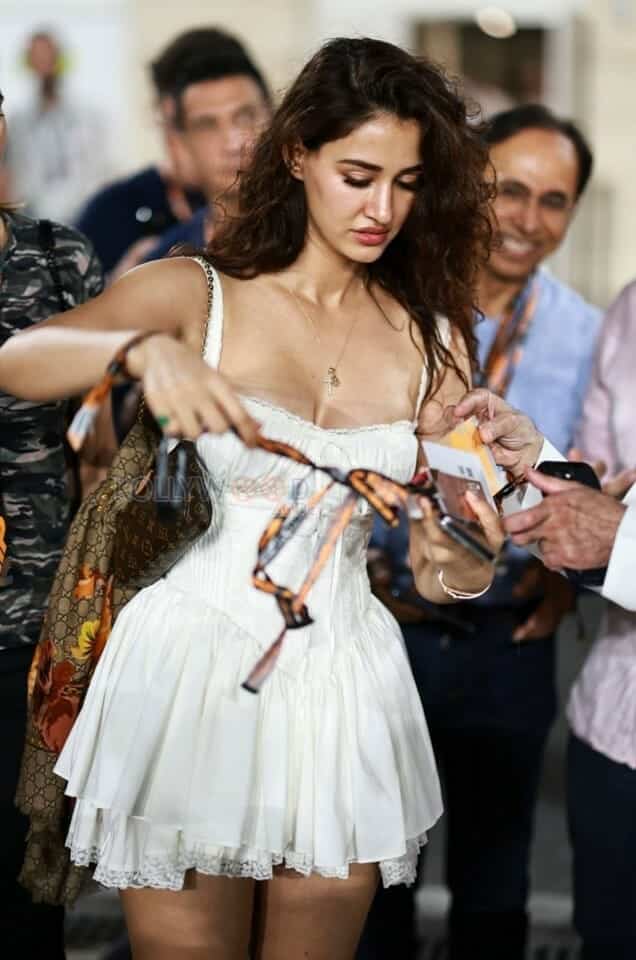 Disha Patani at Doha F1 Race in a White Mini Skirt Photos 03