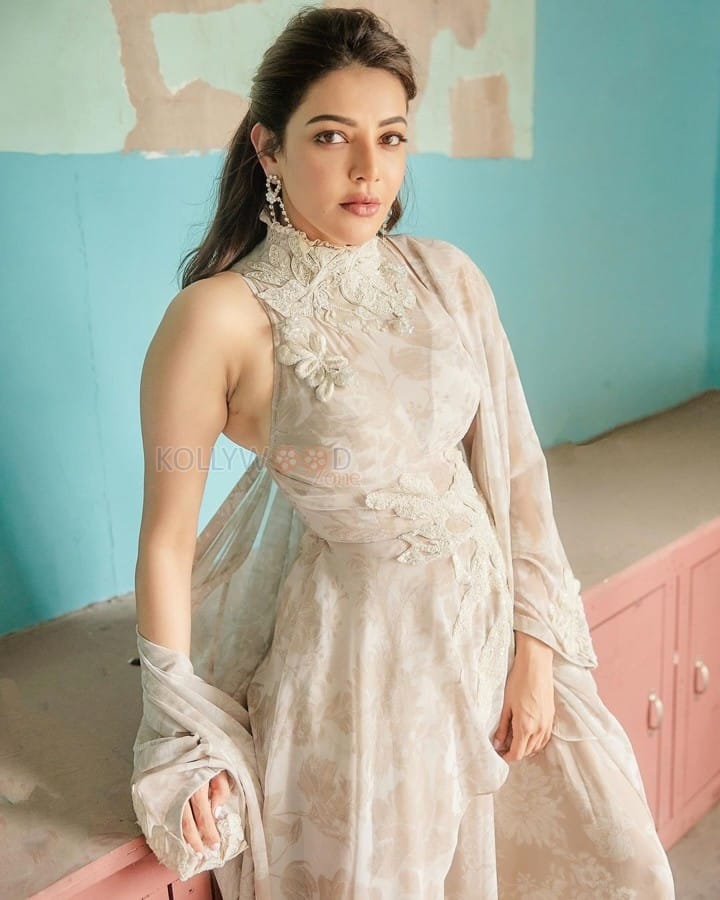 Elegant Kajal Aggarwal in an Off White Sharara with Pearl and Floral Embroidery Photos 05