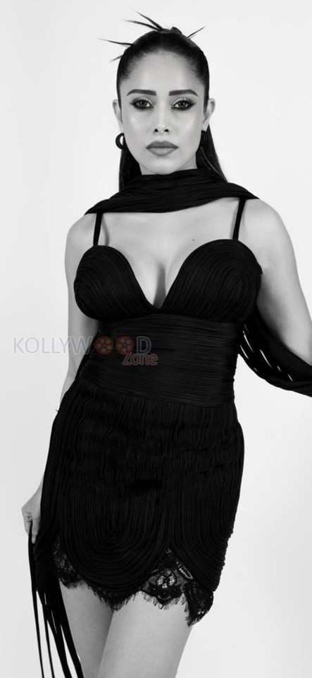 Elegant Nushrratt Bharuccha in a Black Short Dress with Plunging Neckline Photos 01