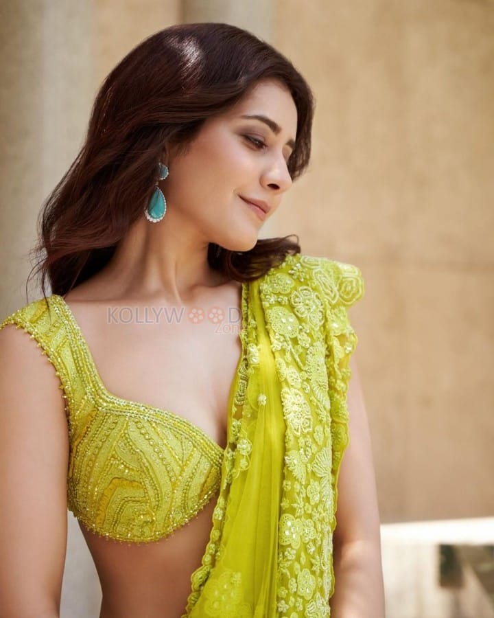 Elegant Raashi Khanna in a Light Green Floral Saree with a Deep Cleavage Neckline Blouse Photos 01