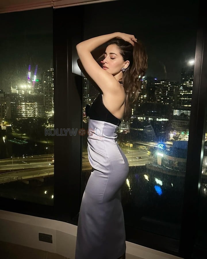 Glamorous Ananya Panday in a Satin Velvet Midi Dress with a Cutout Sweetheart Neckline Photos 04