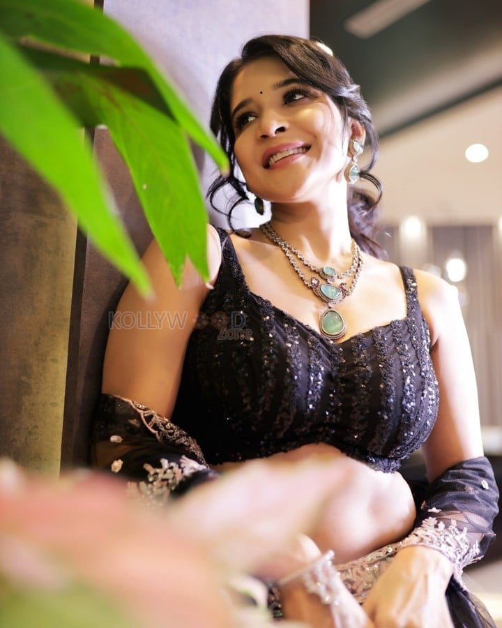 Glamorous Sakshi Agarwal in a Black Floral Lehenga Photos 01