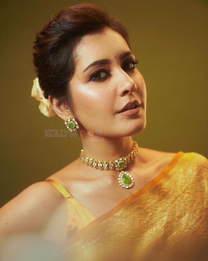 Golden Beauty Raashi Khanna in a Yellow Silk Saree with Sleeveless Blouse Pictures 02