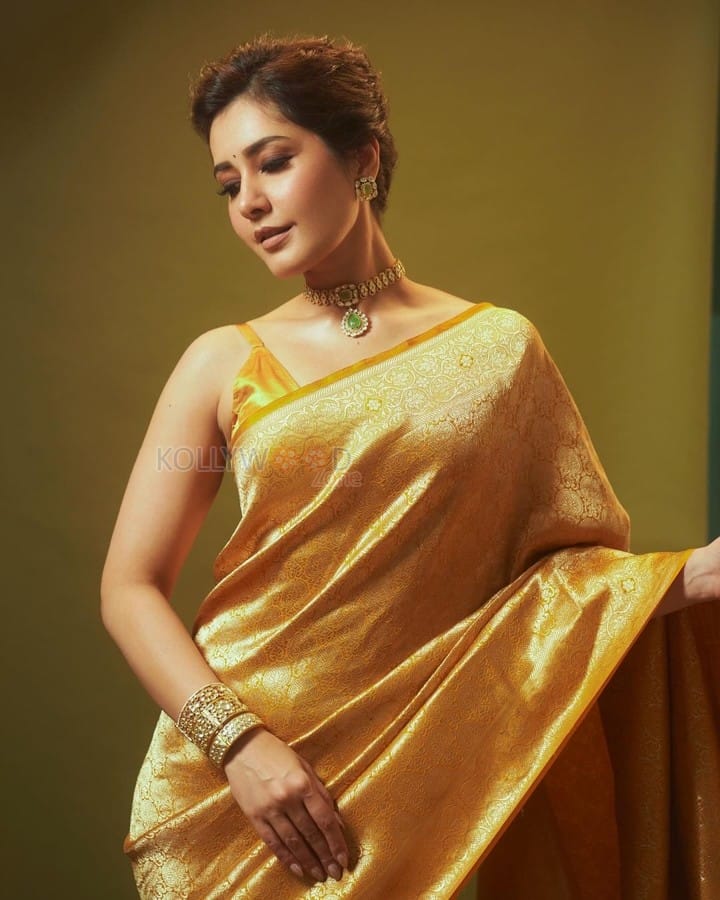 Golden Beauty Raashi Khanna in a Yellow Silk Saree with Sleeveless Blouse Pictures 03