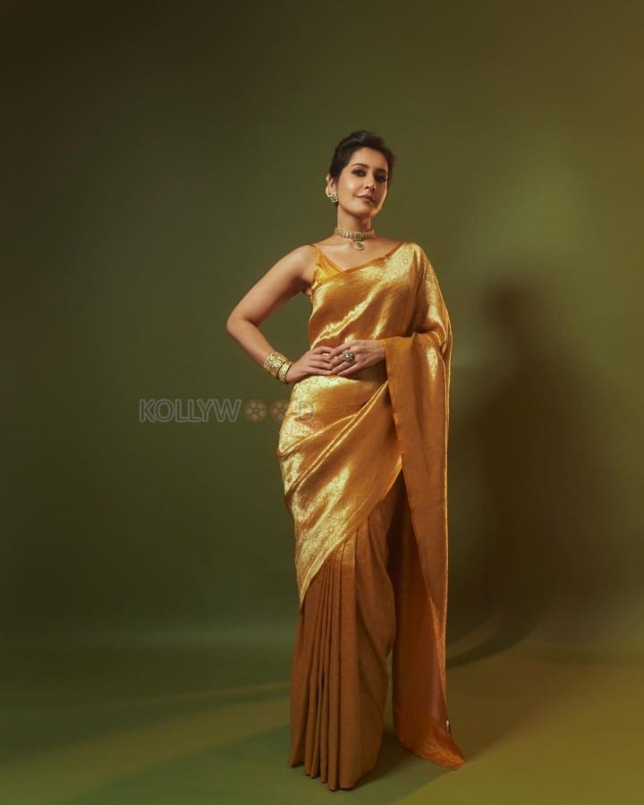 Golden Beauty Raashi Khanna in a Yellow Silk Saree with Sleeveless Blouse Pictures 04