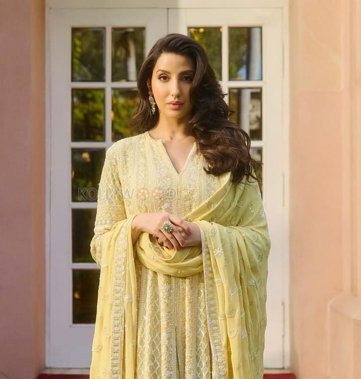 Gorgeous Nora Fatehi in a Yellow Embroidered Anarakli Suit Photos 01