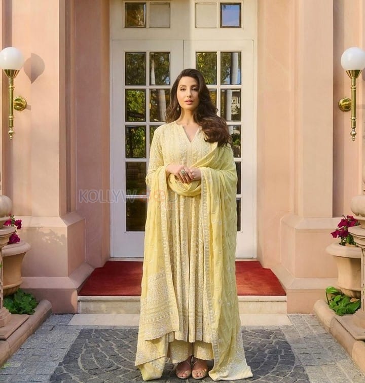 Gorgeous Nora Fatehi in a Yellow Embroidered Anarakli Suit Photos 02
