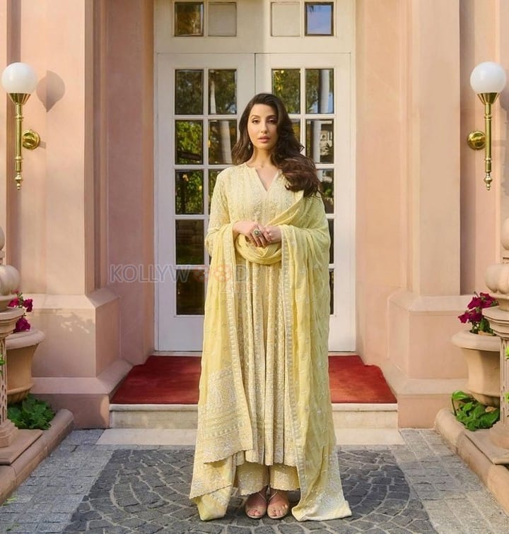 Gorgeous Nora Fatehi in a Yellow Embroidered Anarakli Suit Photos 03