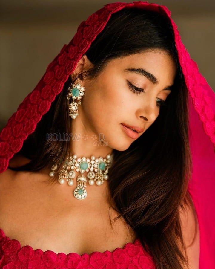 Gorgeous Pooja Hegde in a Pink Lehenga Pictures 01