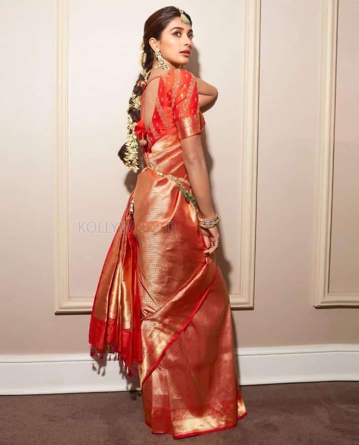 Gorgeous Pooja Hegde in an Orange Kanchipuram Silk Saree Photos 02